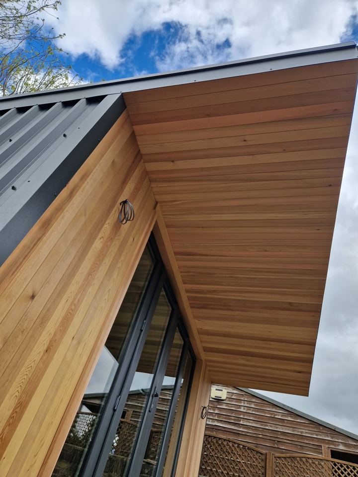 Cedar soffit and cladding meeting at the corner